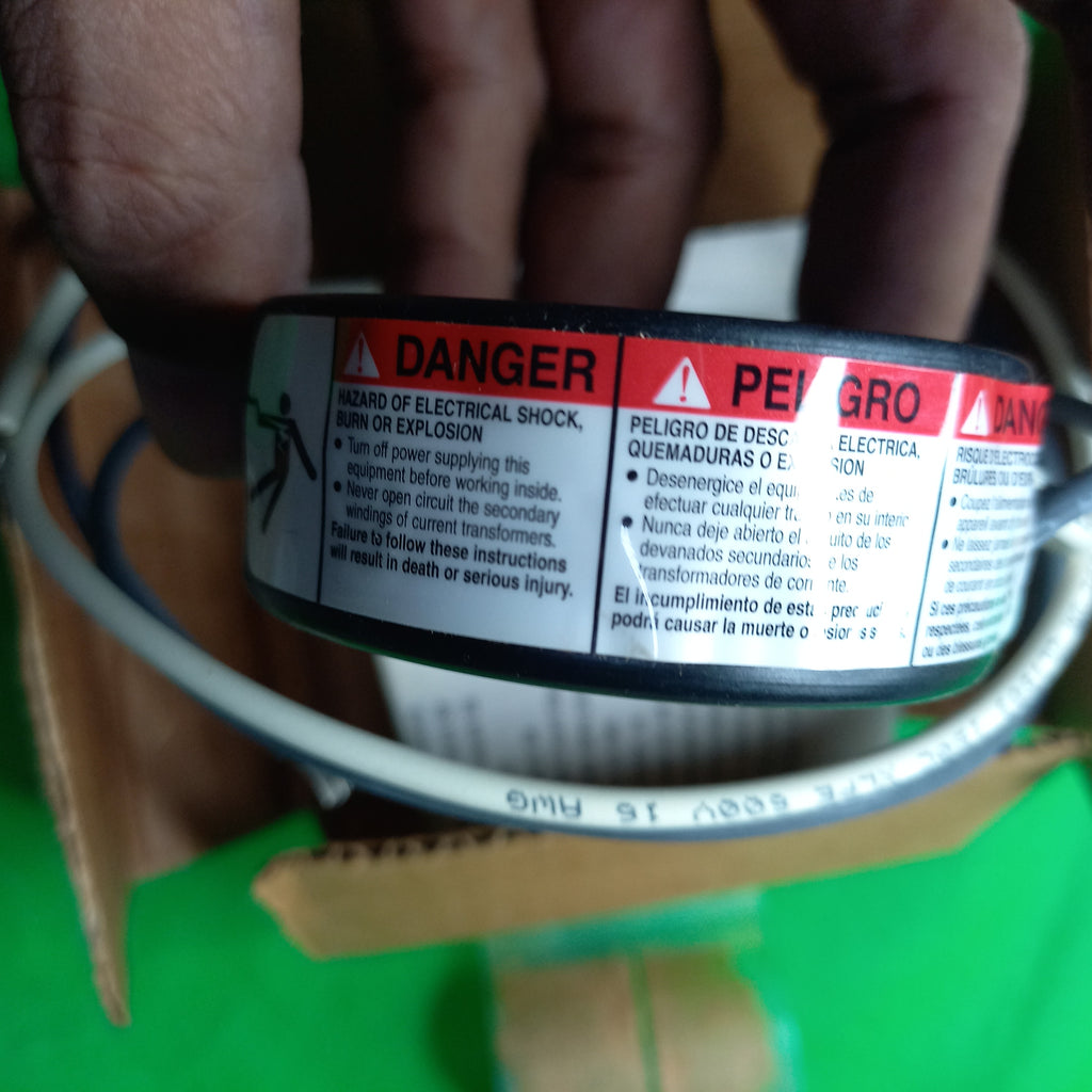 Warning sticker on 2NR301 SquaredD TRANSFORMER CURRENT