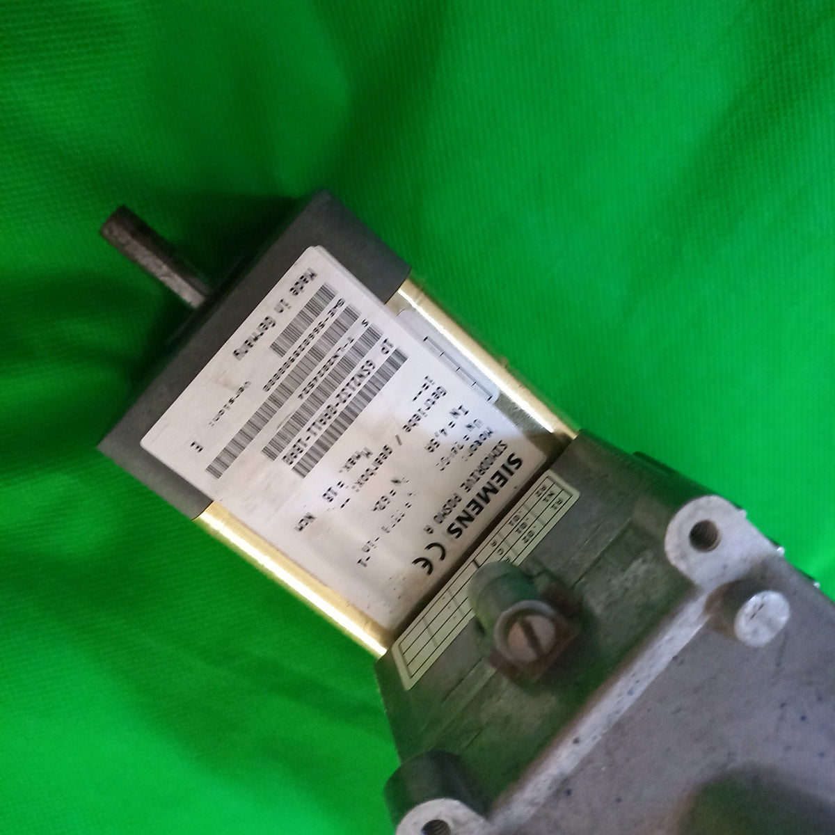 Specification sticker view and Photo from top side includes shaft and mounitng Siemens Simodrive Posmo A, Motor Un=24Vdc, In: 4,5A, 
6SN21320AA111BA0