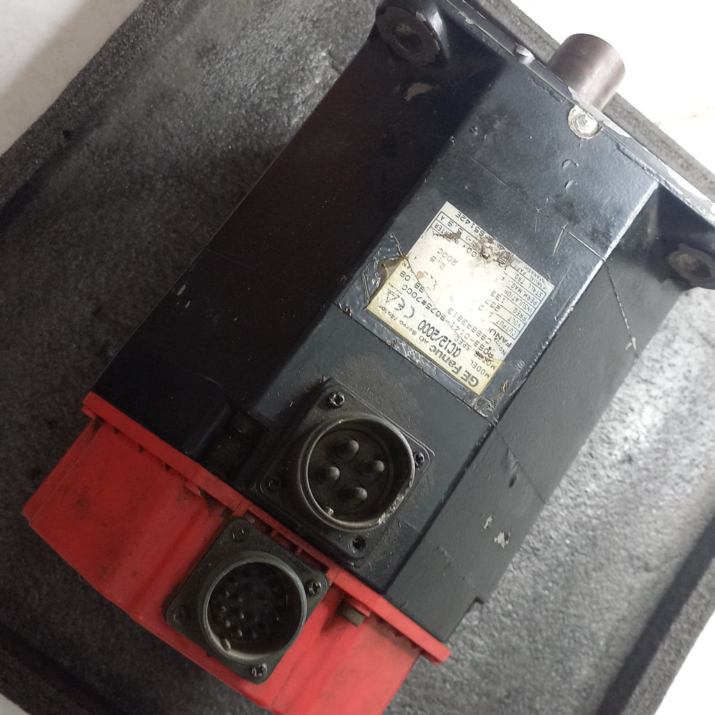 Front view with specification sticker and connector showing of GE Fanuc AC Servo Motor 
Alpha C12/2000
Motor Spec. A06B-0141-B075#7000
