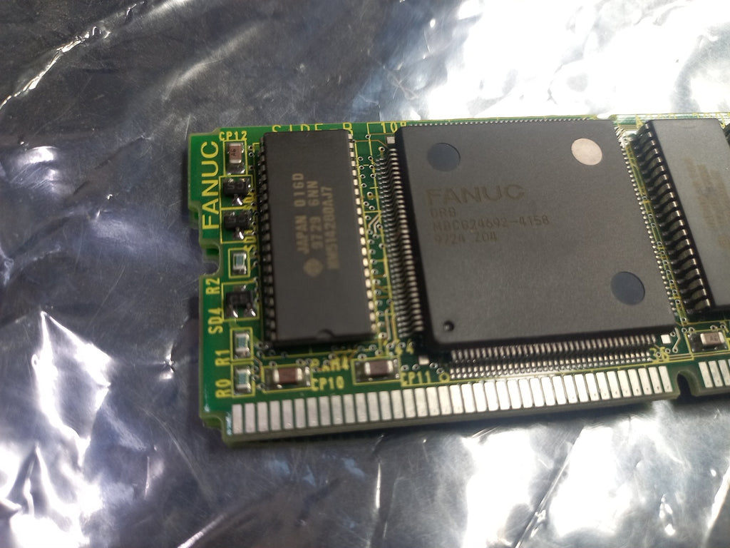 Zoomed left view of Dram Module A350-2901-T946/2 , A20B-2901-0941/02A, A350-2901-T946/2 , 
The Fanuc A20B-2901-0941/02A is a 4MB DRAM memory daughter board module manufactured by Fanuc for industrial CNC machine applications.
