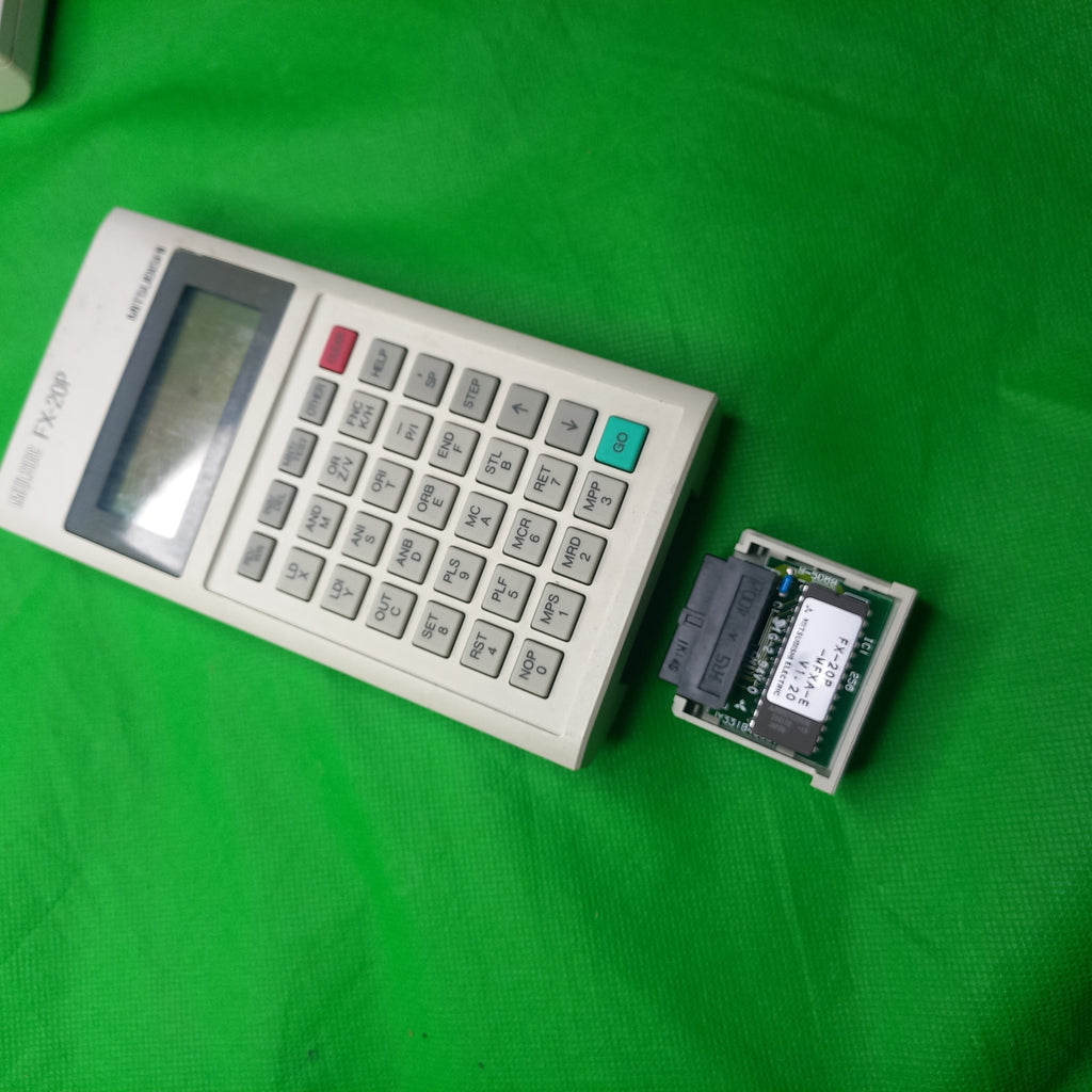 Mitsubishi Programming Panel FThe Mitsubishi FX-20P-E is an obsolete handheld programming panel designed for Mitsubishi FX series programmable logic controllers (PLCs).