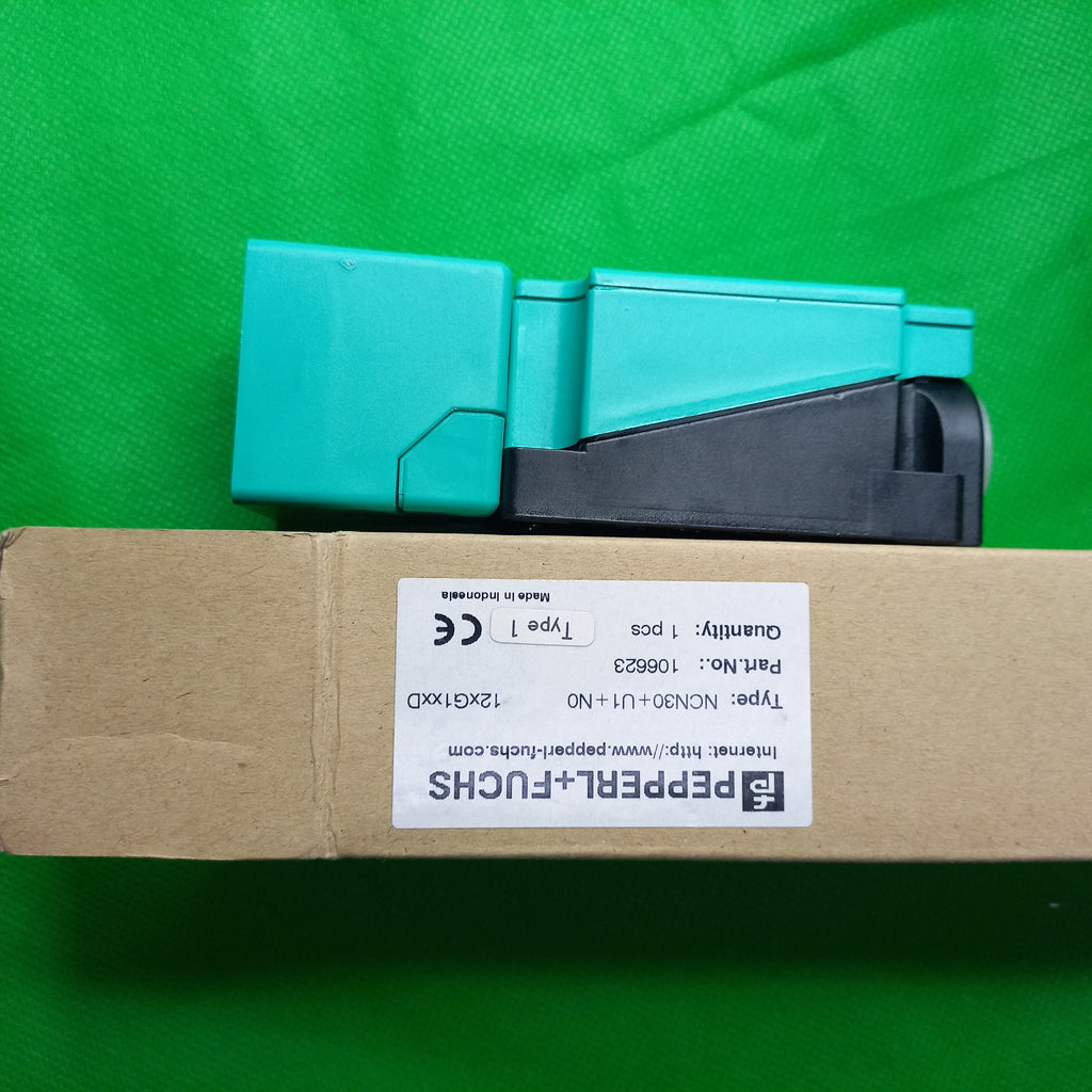 unboxing photo with sticker on box NCN30+U1+N0, 106623, Normally Closed, Output type: NAMUR, Rated operating distance 30mm, Non Flush, 40x40x118
