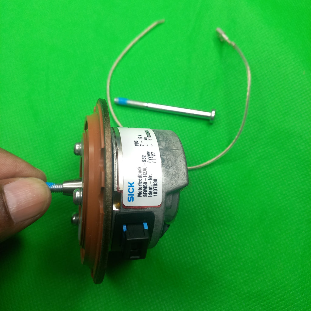 Side view of SRM50 encoder with mounting screw and EArthing wire