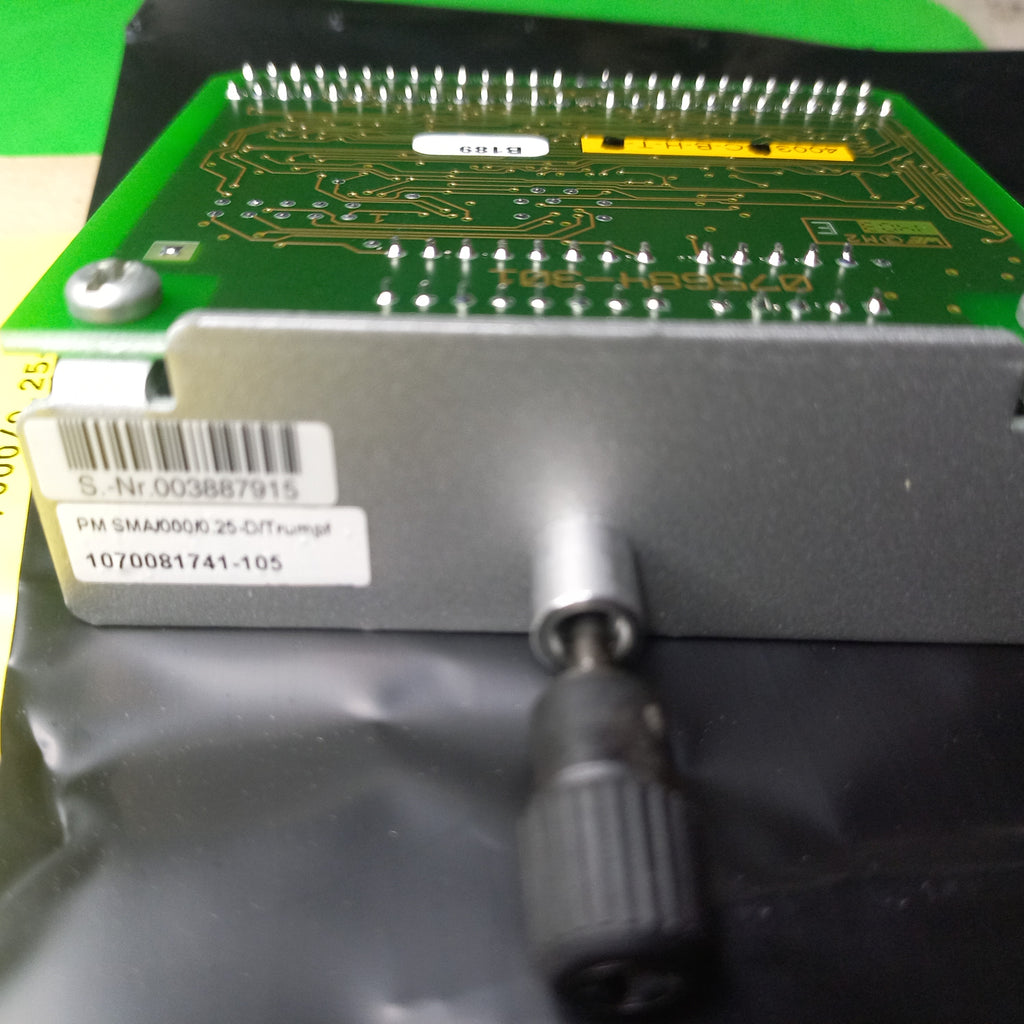 Sticker photo near Hand knob reads PM SMA/000/0.25-D/TRUMPF
1070081741-105 on servodyn module