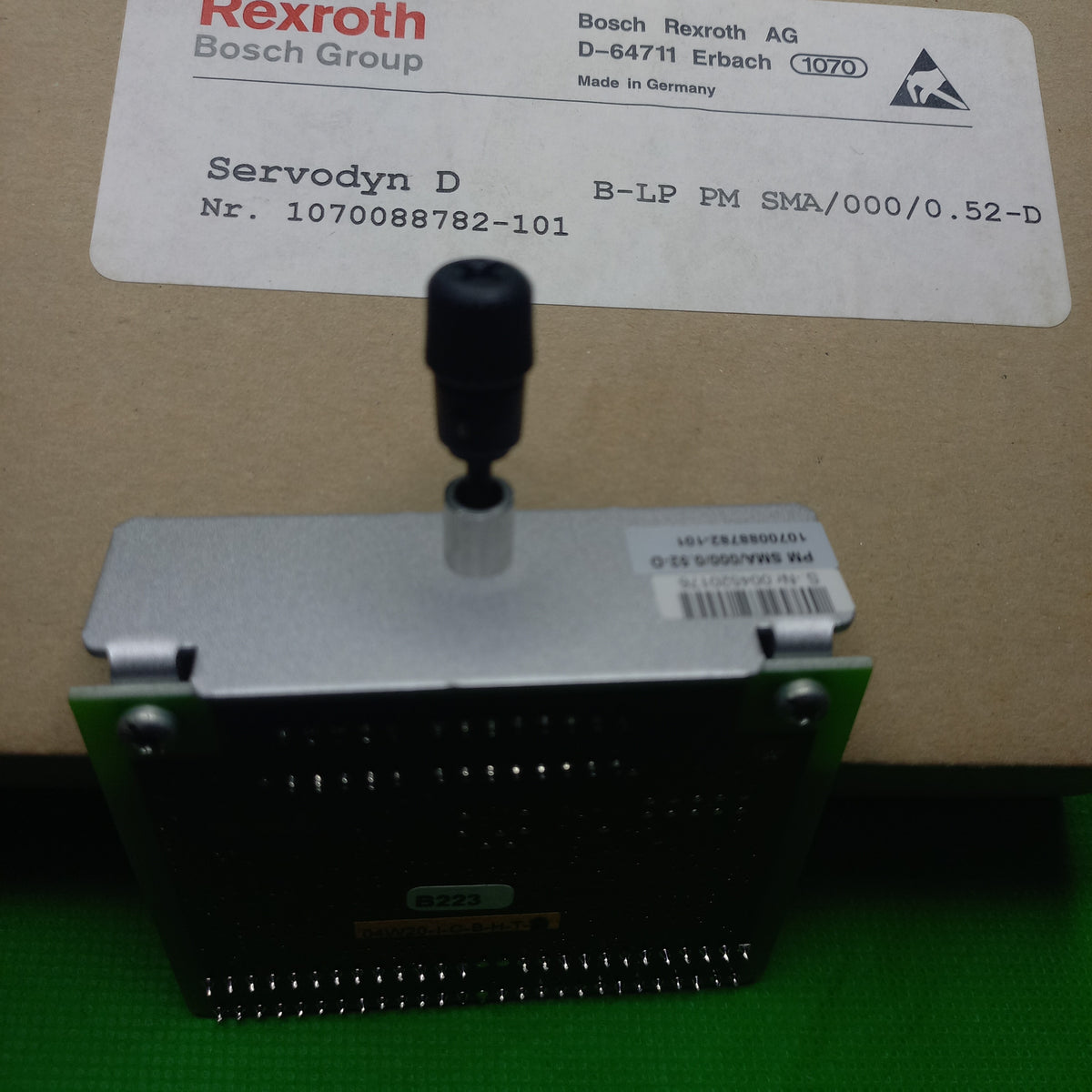 Bosch 1070075683-302 Personality module next to the Original factory box 