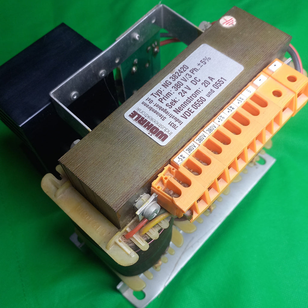 Woehrle Industrieelektronik 
Typ: NG382420
Prim: 380V/3Ph.  +/- 5%
Sek: 24VDC
Nennstrom: 20A
VDE 0550 und 0551