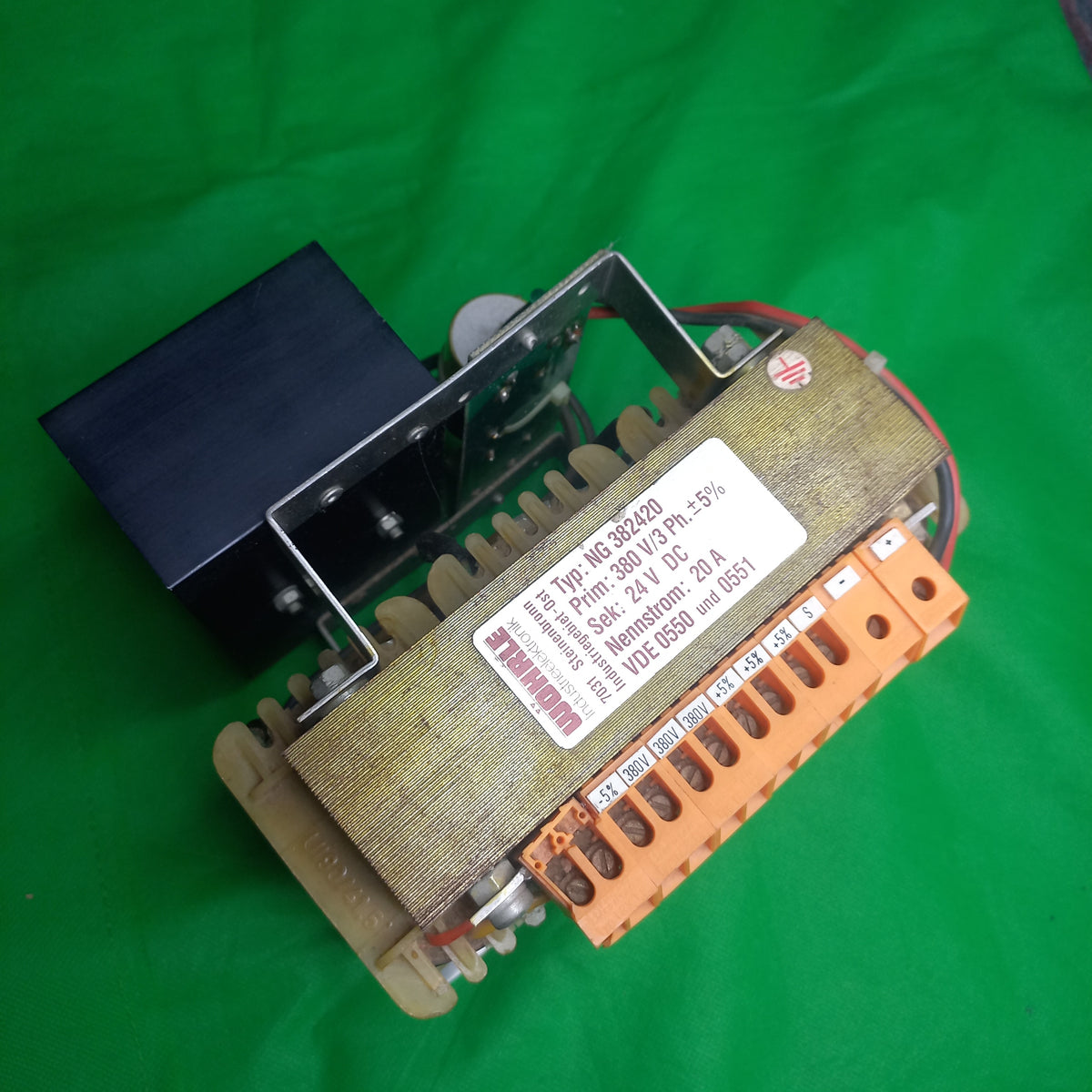 Typ: NG382420 Power supply Wohrle Industrieelektronik 
Prim: 380V/3Ph.  +/- 5%
Sek: 24VDC
Nennstrom: 20A
VDE 0550 und 0551