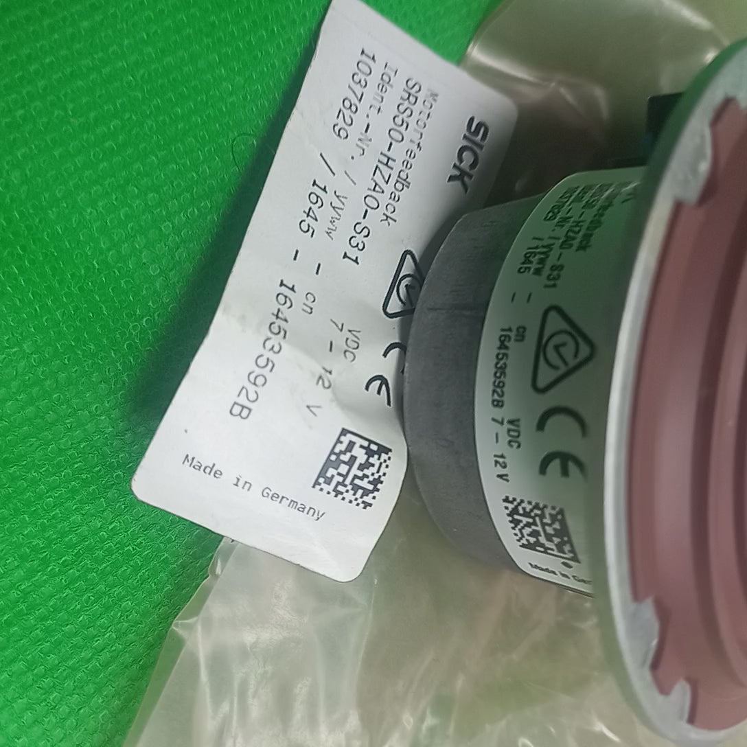 VIdeo showing features dimensinal details shaft, connector and specification sticker of  SRS50 Sick singleturn encoder